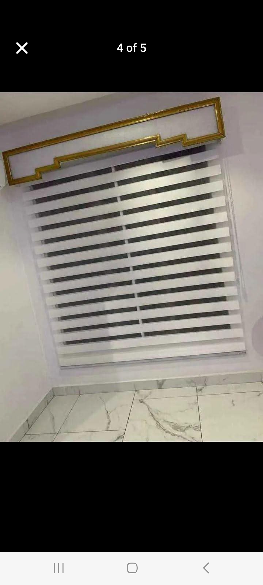 Zebra blinds with gold pelmet