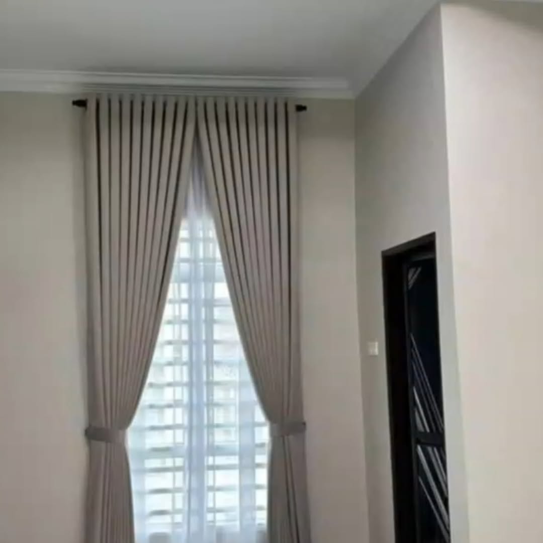 Grey curtains with tiebacks